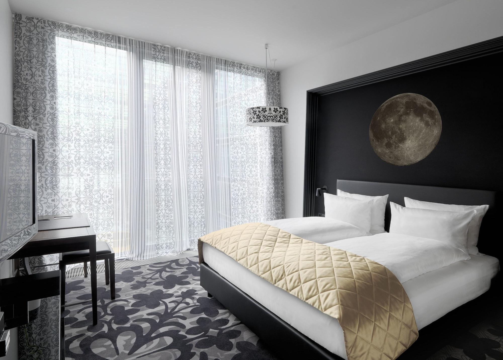 Kameha Grand Bonn Bona Quarto foto A room at the hotel