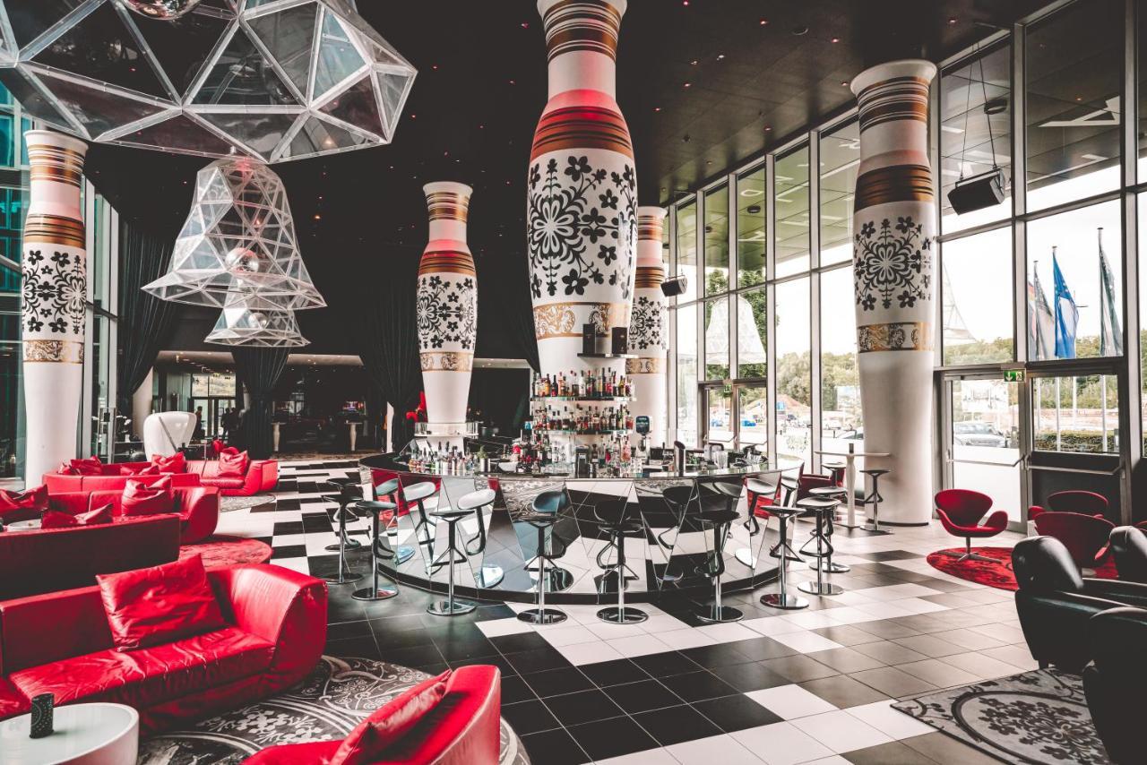 Kameha Grand Bonn Bona Exterior foto The interior of the restaurant
