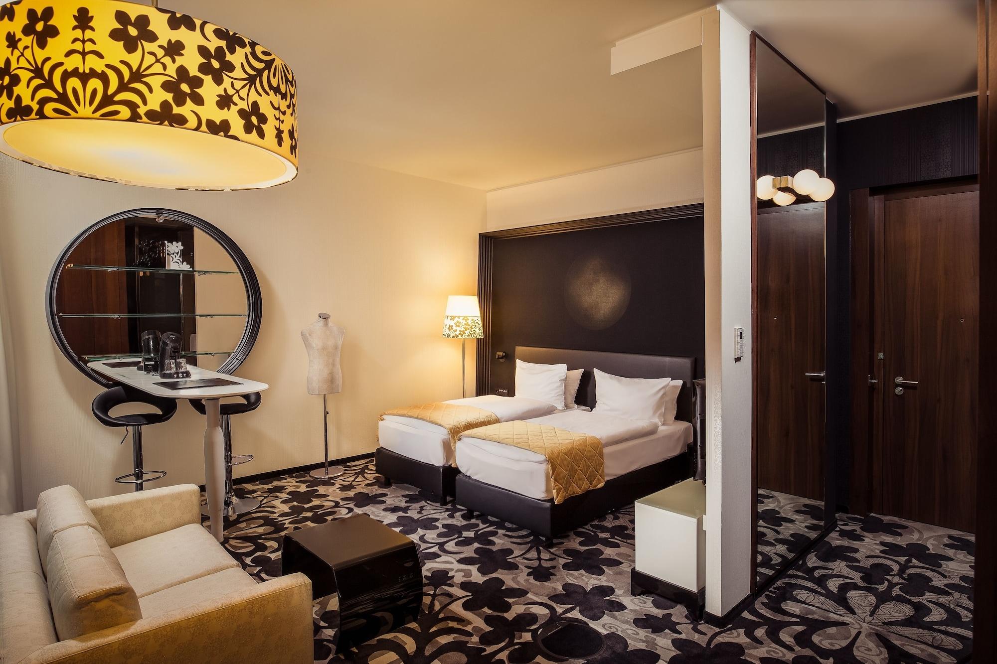 Kameha Grand Bonn Bona Exterior foto A room at the Hotel Savoy