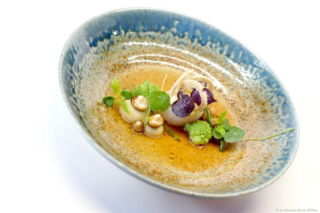 Kameha Grand Bonn Bona Exterior foto A dish from the restaurant